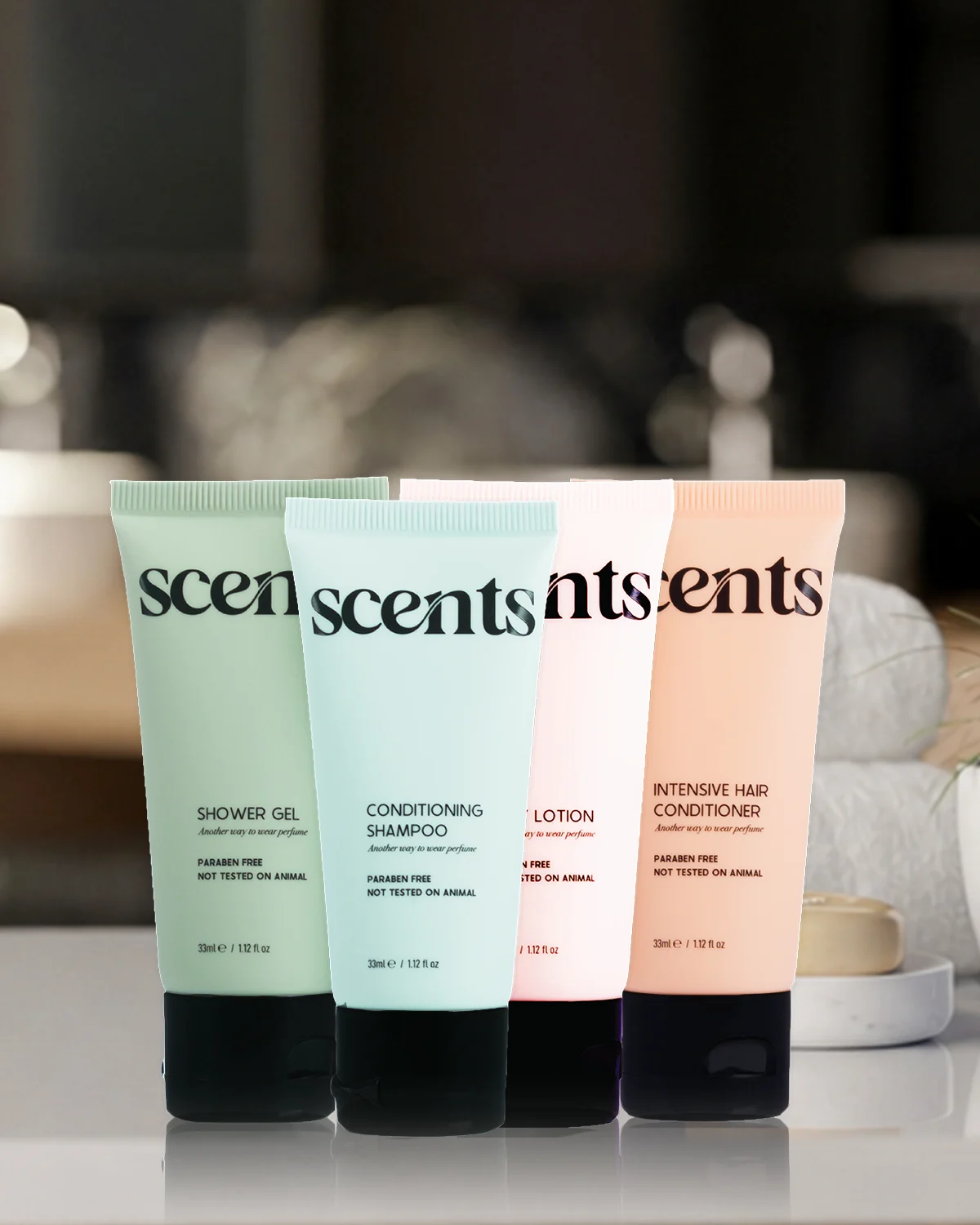 Scents 7 bath and body tubes arranged on a bathroom counter.