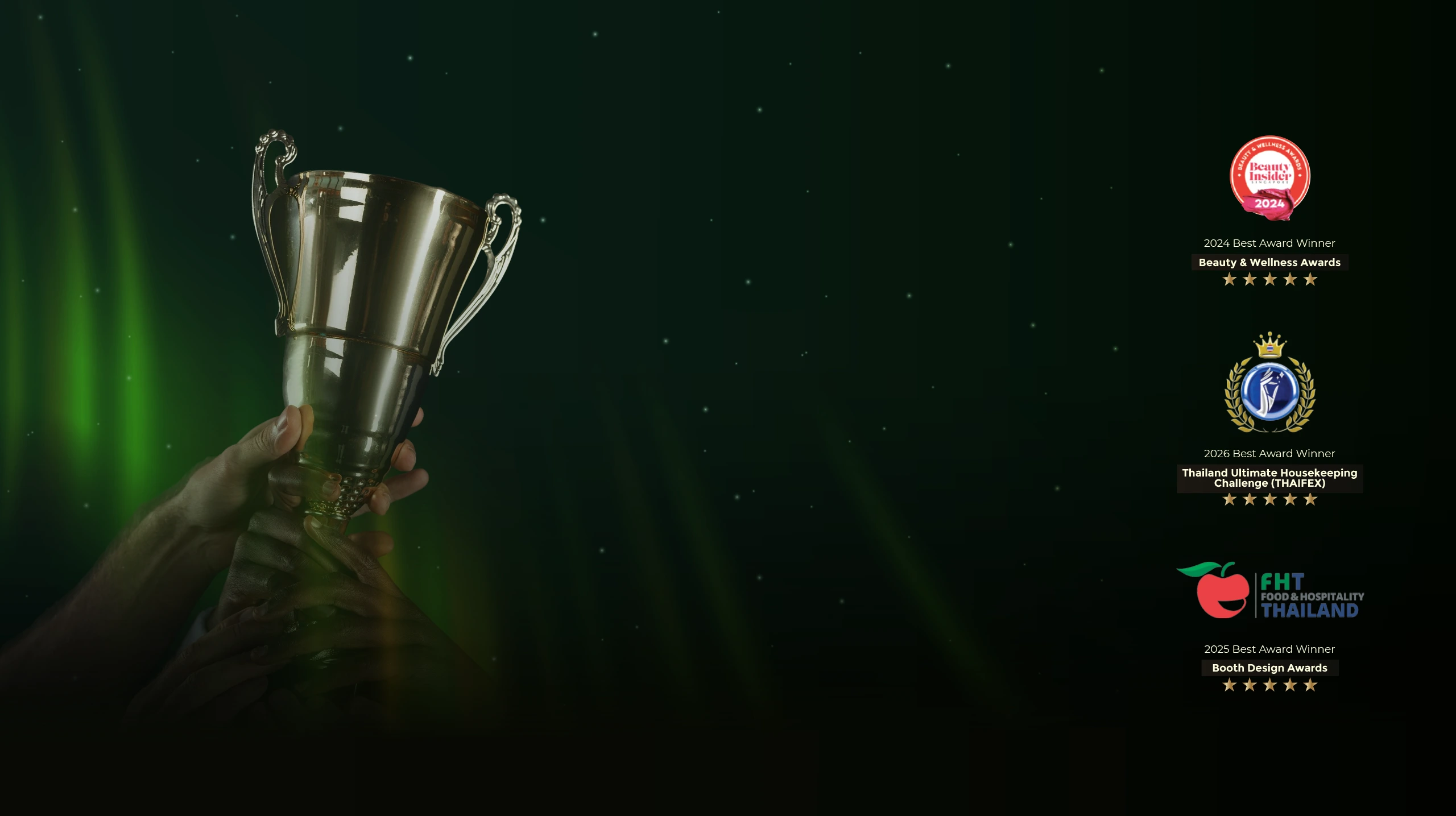 A trophy displayed with three hospitality award panels.